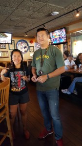 The host, Lourdes, and the 50/50 raffle draw winner, Paulo.